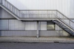 Close up view on metallic stairs at a modern architecture building. photo