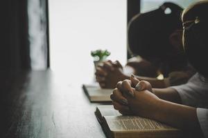 Two women praying worship believe photo