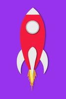 red spaceship paper isolated on purple background and clipping path design paper photo