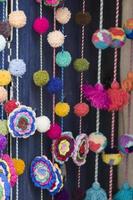 Decorative pompoms on the market in Cusco, Peru photo