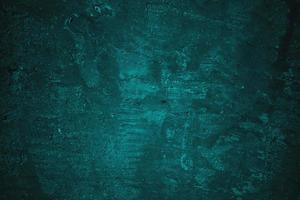 Abstract grunge blue stucco wall background. Dark stone wall concept background with space for text. photo