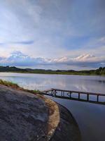 Wooden bridge over lake photo