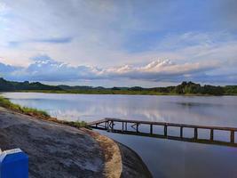 Wooden bridge over lake photo