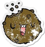 distressed sticker of a cartoon cookie vector