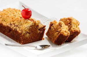 Sweet honey cake with nuts and cherry