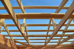 Details of construction wooden roof, roofing timber structure system. photo