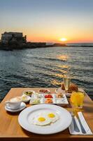 Romantic dinner place with idyllic panoramic view of mediterranean sea photo