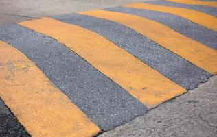 traffic safety speed bump on the road photo