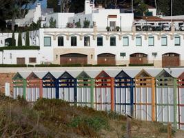 typical colorful huts on the beach of S'Agaro photo