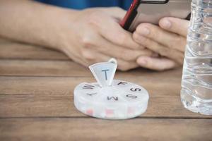 People prepare daily medicine tablet in pillbox - people healthcare with medicine pills concept photo