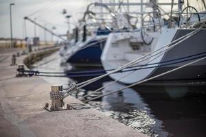 Boats Docked With Rope photo