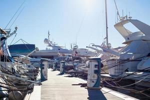 Moored yachts charching with fuel and electricity photo