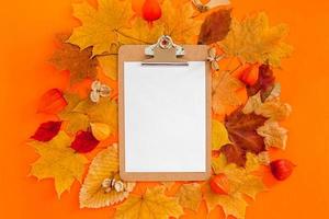 Autumn clipboard mockup with fall leaves