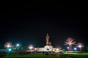 Bangkok, Thailand - 2017, October 29 - Buddhists pray to the 15.87 m high Buddha statue at Phutthamonthon in Asalha Puja Day photo