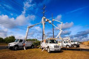 Utility Workers and Trucks photo