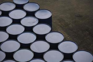 Top view oil barrels blue or chemical drums vertical stacked. photo