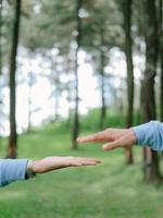 young indonesian couple hand photo