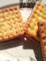 snack crackers filled with fermented cassava made by mother, for breakfast. photo