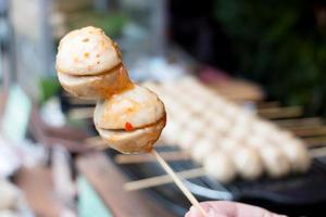grilled meatball with spicy sauce photo
