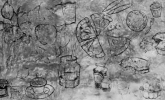 dibujo de comida en la pared de cemento foto