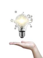 Light bulb in, new ideas with innovative technology and creativity. creative idea with sparkling light bulbs photo