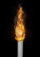 Smoking, death and danger concepts are burning cigarettes. that cause lung cancer and serious health risks photo