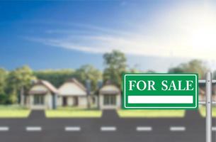 Home For Sale with green for sale sign photo