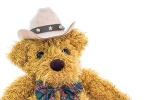 Close up cowboy teddy bear on white photo