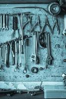 Old tool shelf against a wall photo