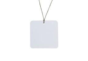 Blank tag tied for hang on product for show price or discount isolate on white background with clipping path photo