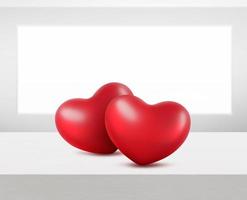 Red hearts on white wooden table with copy space photo
