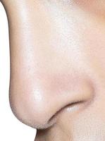 close up shot of woman nose photo