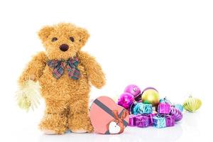 Teddy bear with red heart shaped gift box photo
