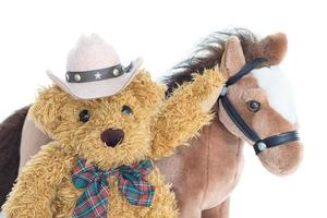 Cowboy Teddy bear and horses photo