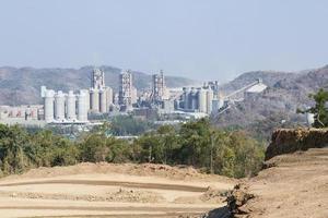 Cement factory  in the mountains photo