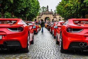 GERMANY, FULDA - JUL 2019 rearview lights of red FERRARI 488 SPIDER Type F142M coupe is a mid-engine sports car produced by the Italian automobile manufacturer Ferrari. The car is an update to the 458 photo