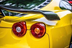 GERMANY, FULDA - JUL 2019 rearview lights of yellow FERRARI F430 Type F131 cabrio is a sports car produced by the Italian automobile manufacturer Ferrari from 2004 to 2009 as a successor to the Ferrar photo