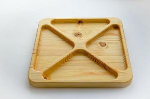 Portioned wooden yin yang dish on a gray background. Empty plate or tray, top view. combination plate photo