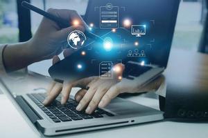 Online transactions, Businessman touching fingerprint scan provides security interface payment shopping banking and cloud computing network connection on virtual screen. photo