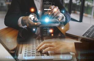 Online transactions, Businessman touching fingerprint scan provides security interface payment shopping banking and cloud computing network connection on virtual screen. photo