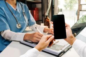 Double exposure of technology healthcare And Medicine concept. Two doctors using digital tablet and modern virtual screen interface icons panoramic banner, blurred background. photo