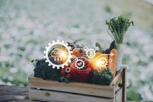 Futuristic businessman farms vegetables and crops using modern AI technology using mobile phones, temperature and humidity sensors, water tracking, climate control, holographic data data icons. photo