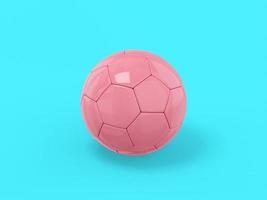 fútbol de un solo color rosa sobre un fondo monocromático azul. objeto de diseño minimalista. icono de renderizado 3d elemento de interfaz ui ux. foto