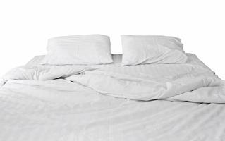 white bedding and pillow isolated on white background photo