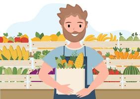 Young man shop assistant in fruit and vegetable shop. Male shop assistant is standing near counter with bag in his hands. Farmer is selling fruits and vegetables Young man is selling organics product vector