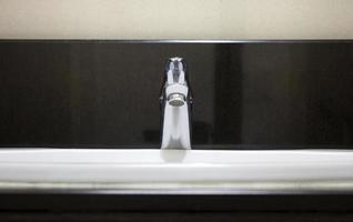Faucet in a bathroom photo
