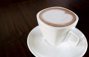 cup of coffee on table photo