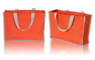 orange shopping bag on white background photo