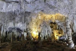 stalagmite and stalactite in cave photo