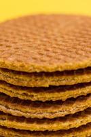 Stroopwafel On Yellow Background photo